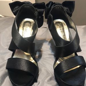 Black heels with bow on back